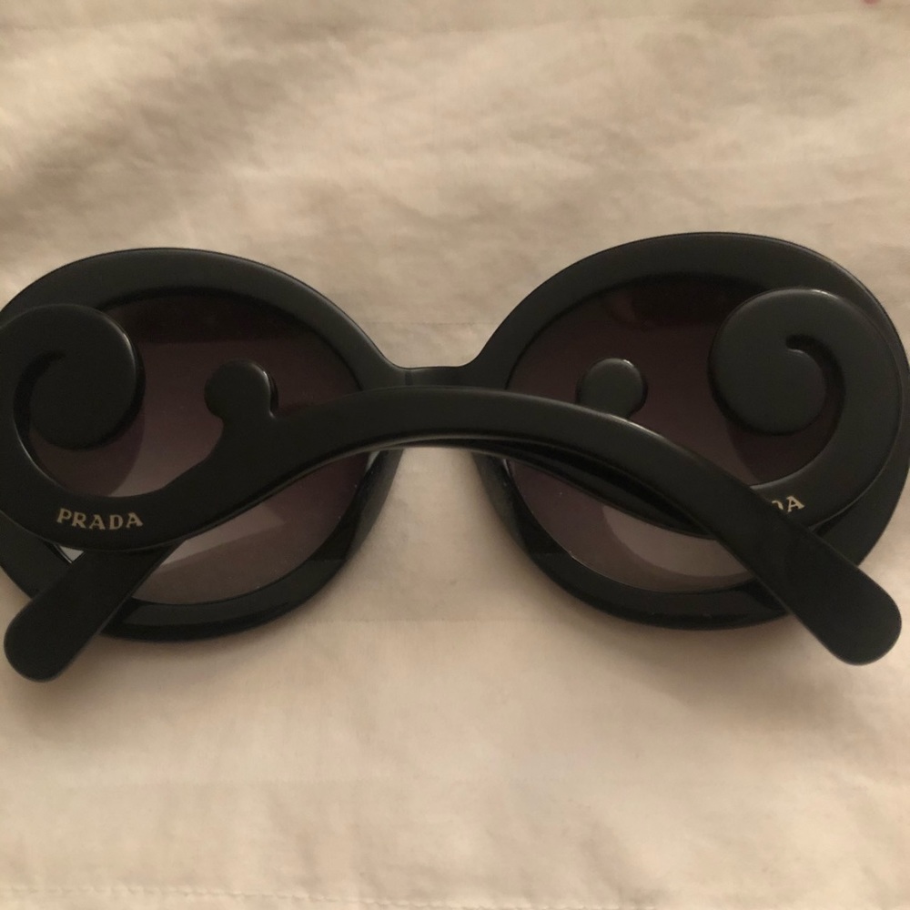 PRADA swirl classic black sunglasses.